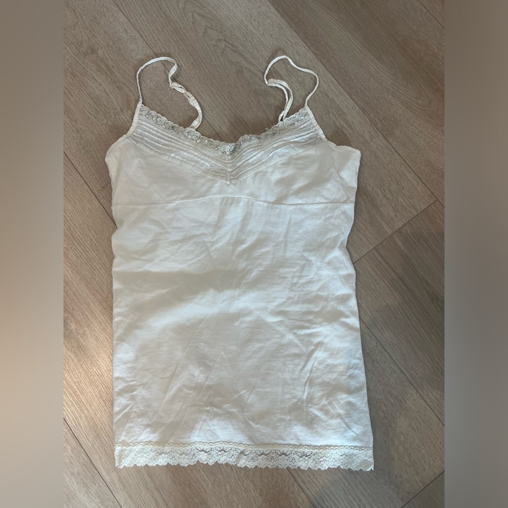 White urban behavior tank top with sparkles at the top